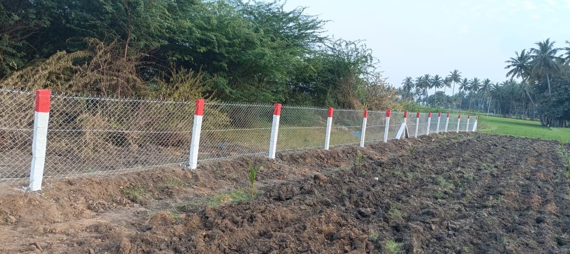 Red and white post fencing, Chennai
